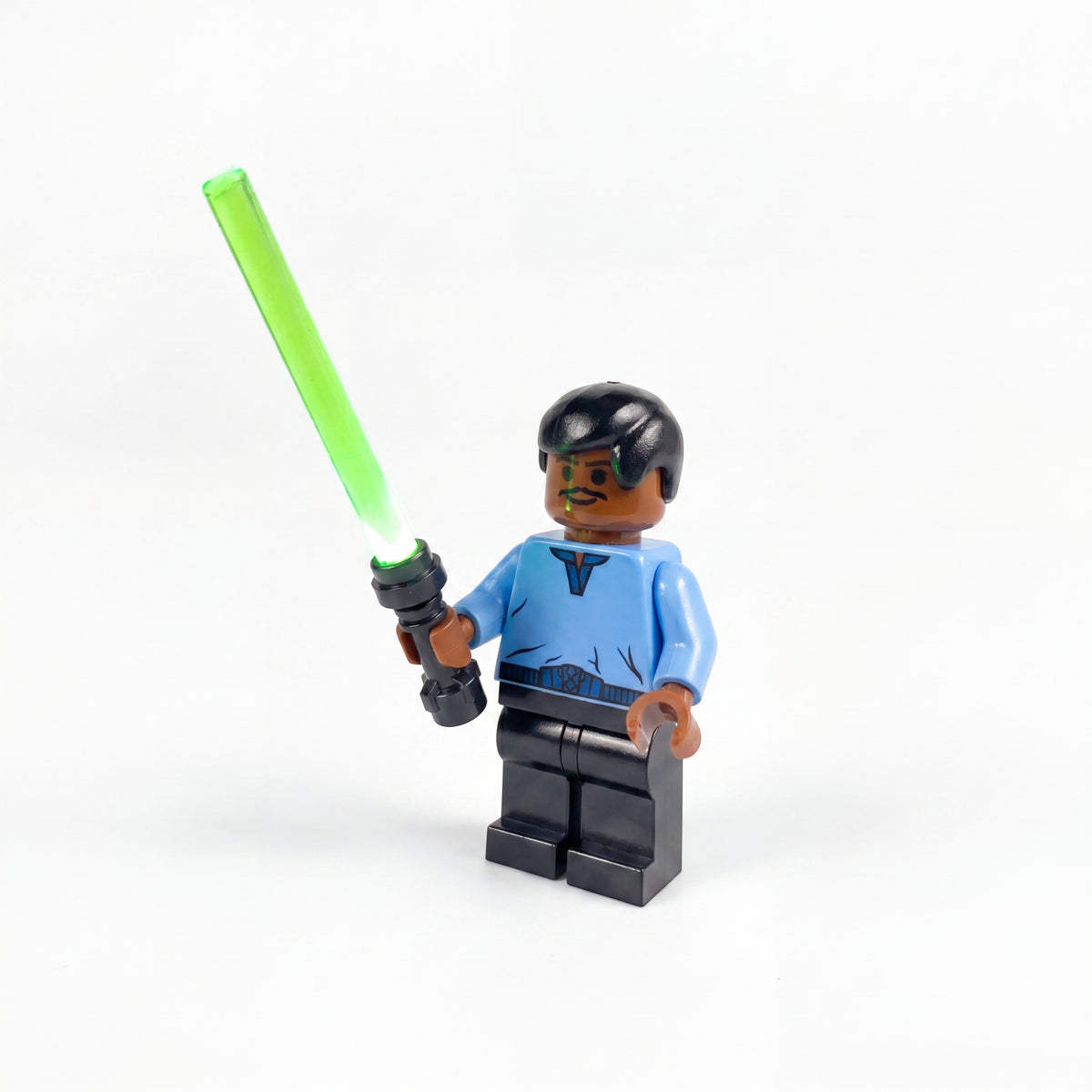 LEGO minifigure with green LED lightsaber